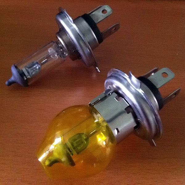 Yellow bulb caps on H4 bulbs